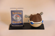 Blastoise Card Display from behind: the back of the One-Touch case and the shell and cannons on the Pokéball.