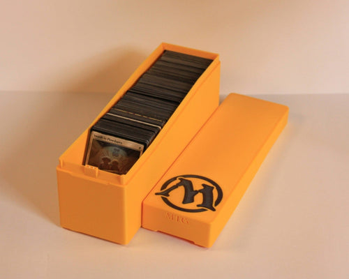 storage_cards|Card Storage Box open, holding a stack of standard trading cards, with the lid alongside