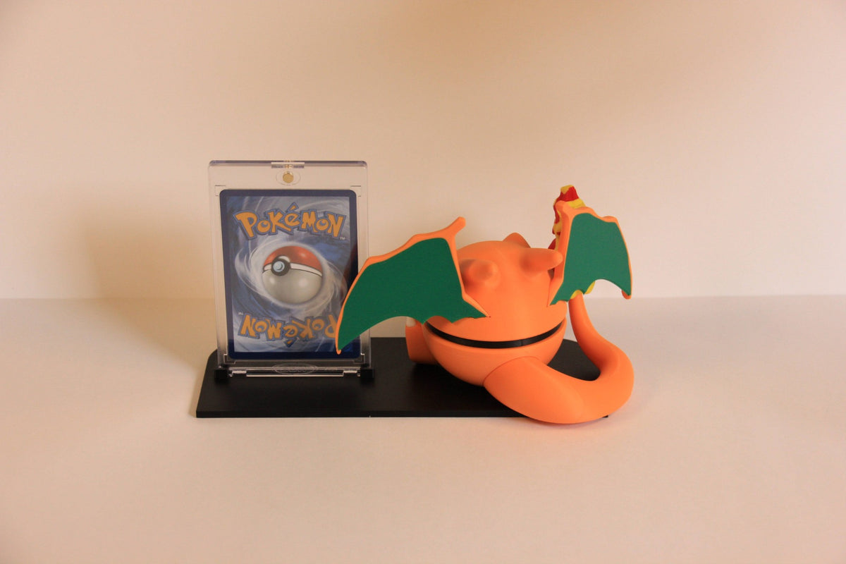 Charizard Card Display from behind: the Pokéball's tail and the back of the One-Touch case.