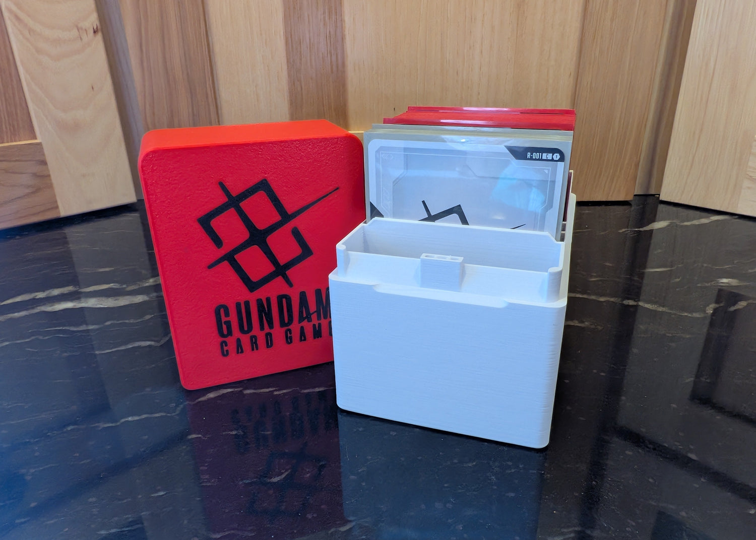 standard_gundam|Gundam Card Game Standard deck box base with cards loaded behind the divider, next to the logo lid