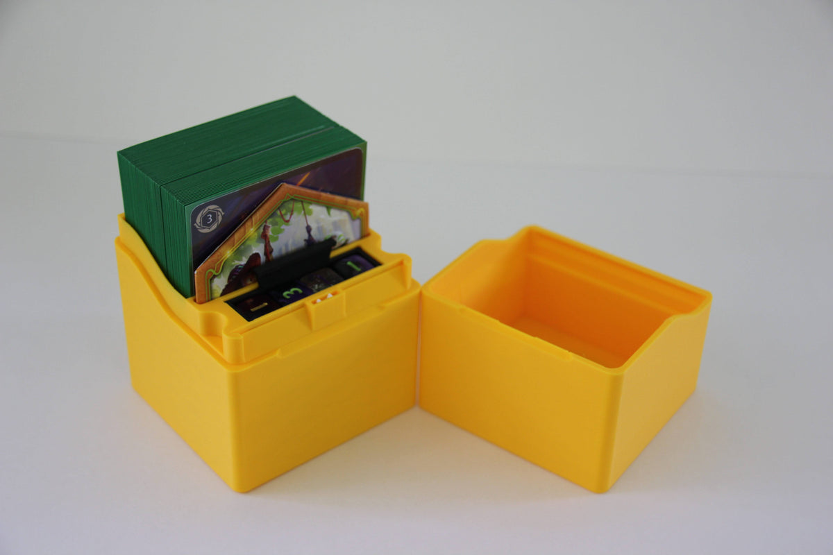 standard_lorcana|Disney Lorcana Standard deck box open with a green-sleeved deck and the lore counter dice tray in the base
