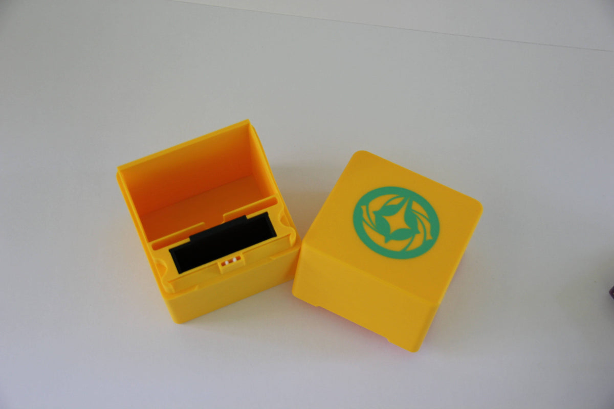 standard_lorcana|Disney Lorcana Standard deck box open from above, showing the deck well, black tray slot and emblem lid