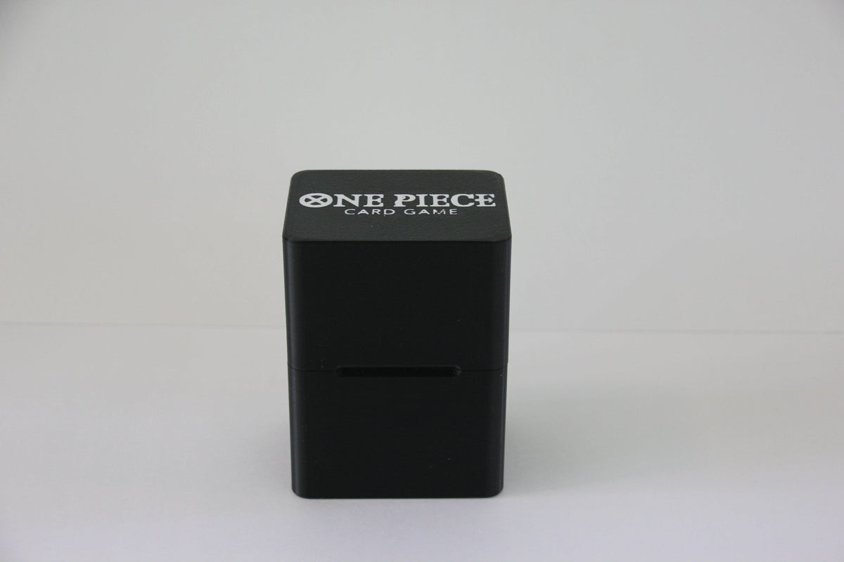 standard_one_piece|Black One Piece Card Game Standard deck box closed, with the One Piece Card Game logo on the lid