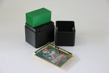 standard_one_piece|One Piece Standard deck box split into its two compartments with a sleeved deck loaded and a Yamato leader card in front