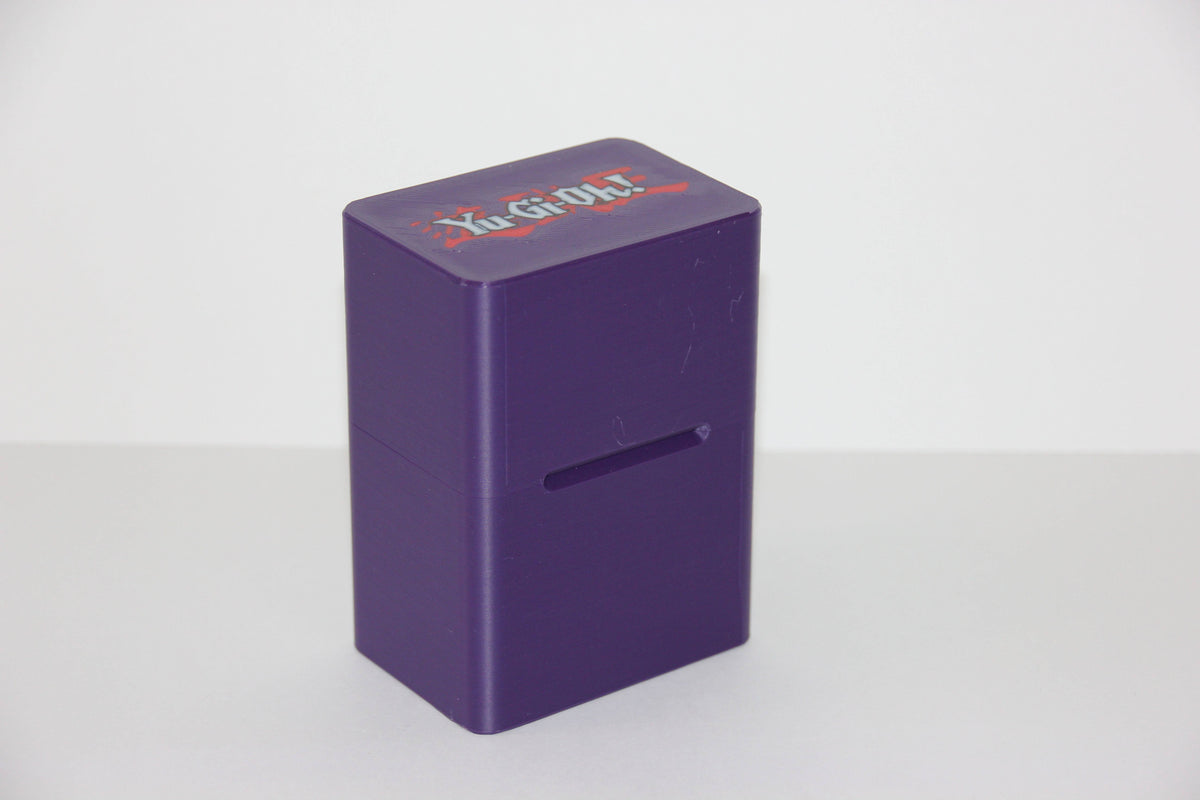 standard_yugioh|Purple 3D printed Yu-Gi-Oh deck box closed with the Yu-Gi-Oh logo on the lid
