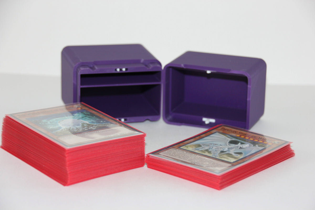 standard_yugioh|Purple Yu-Gi-Oh deck box interior with two sleeved deck stacks